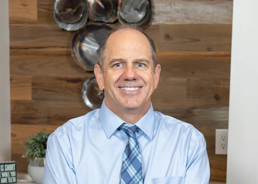 Dr. James Slaman in his office in Albuquerque.
