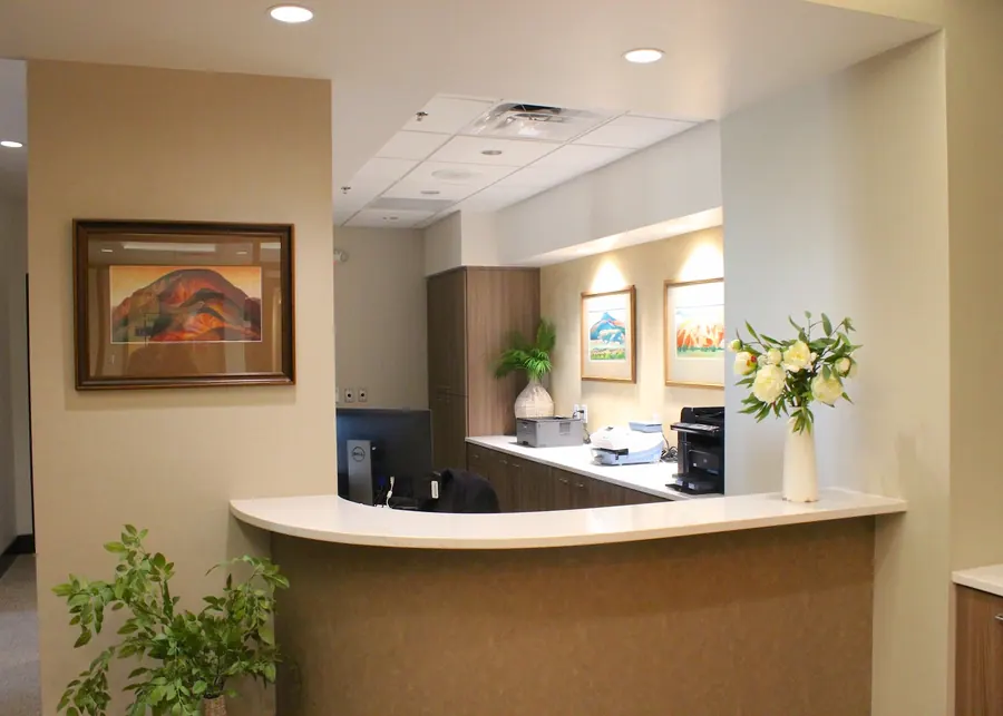 The reception desk at Dr. Slaman & Associates, where new patients check in.